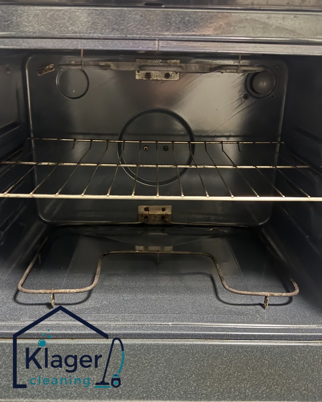 Oven interior after cleaning, with clean racks and door glass