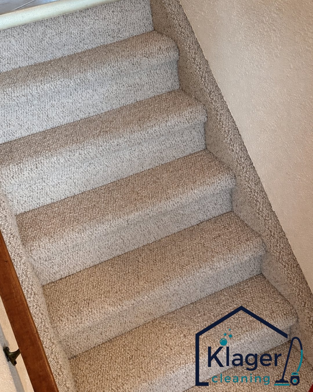 Clean carpeted staircase with visible cleaning lines